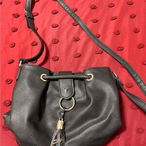 Guess Black Pebbled Leather Crossbody Bag with Tassel Ring Accent